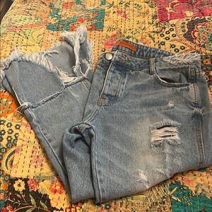 Distressed Light Blue Jeans